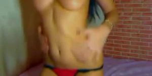 Beautiful babe stripping and masturbating
