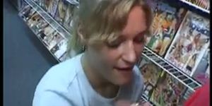 Horny blonde chick sucks a huge cock in the porn store, gets cum in her mou