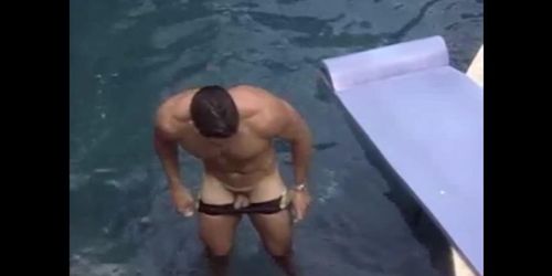 American bodybuilder Darren Fernandez showing off his small dick in a pool