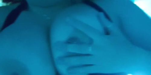 Young British student flashing big boobs underwater