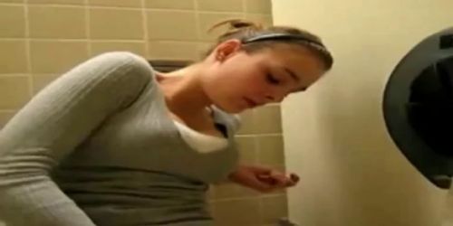 Nice teen masturbating in school restroom